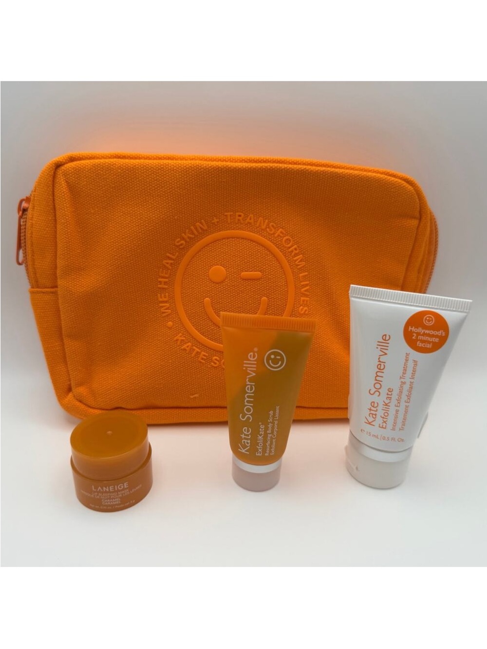 Kate Somerville Orange Canvas Cosmetic Pouch with Travel Skincare